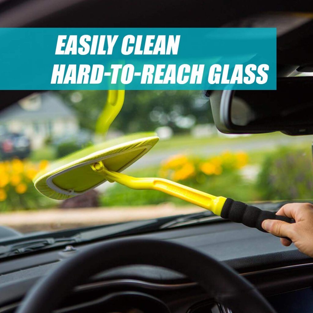 Invisible Glass Reach and Clean Tool being used to Clean a Windshield